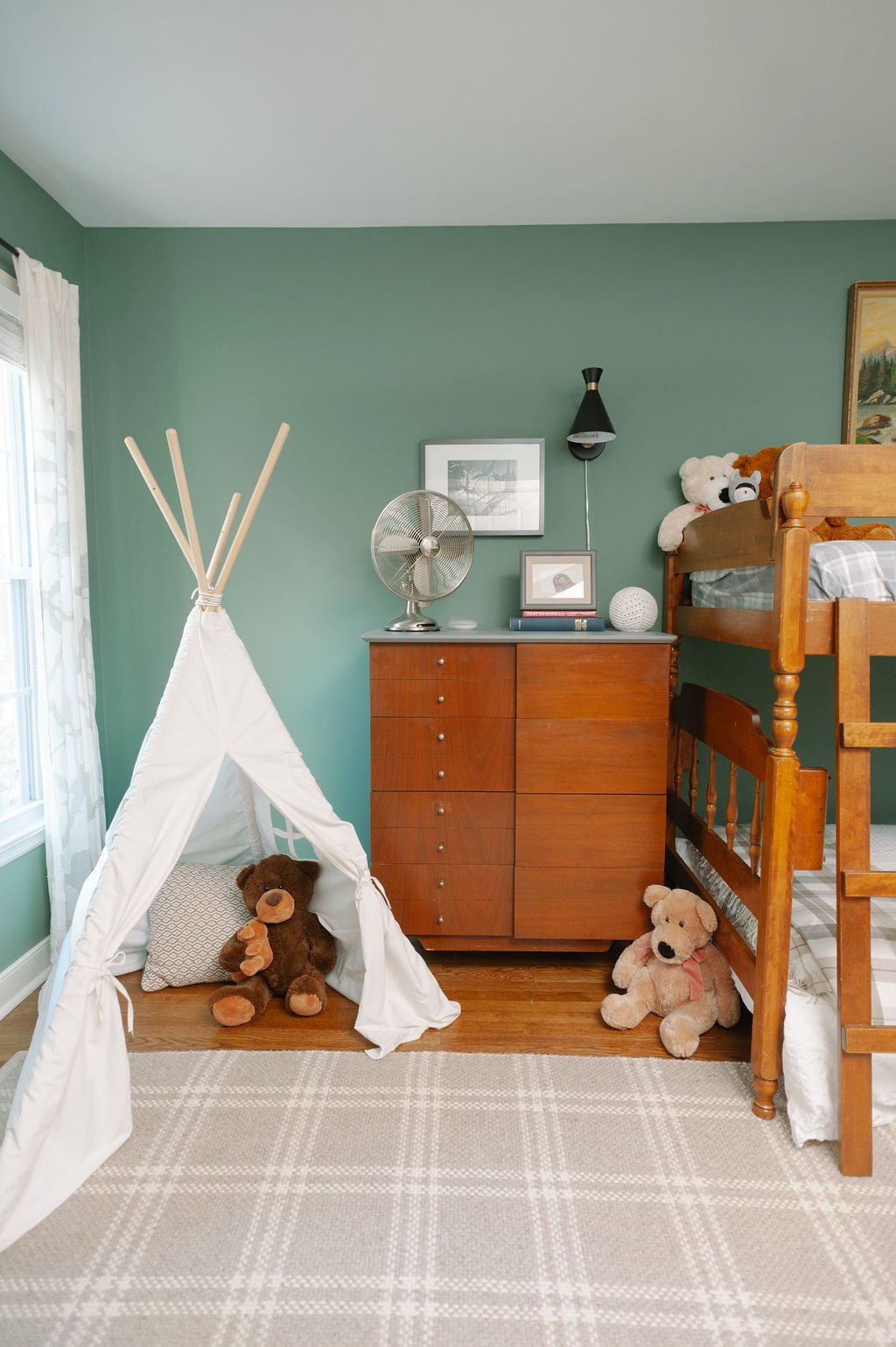 Little boy's bedroom painted Sherwin Williams Privilege Green, midcentury furniture, vintage details, teepee
