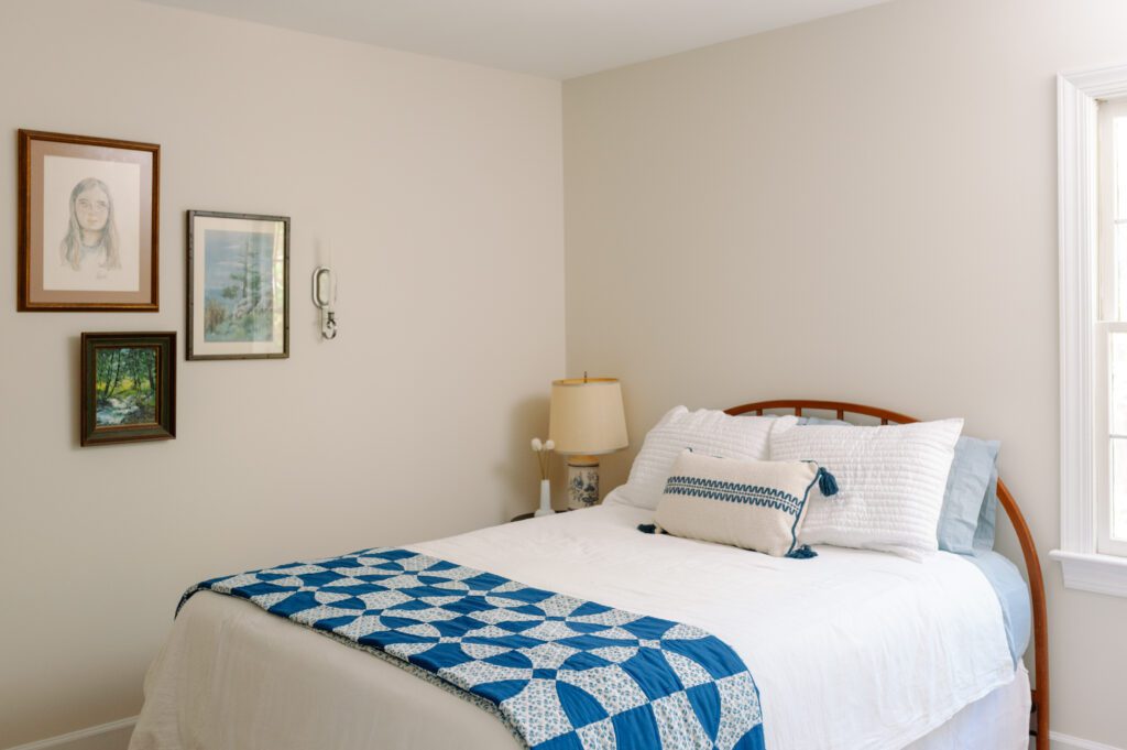 after staged blue quilt traditional bedroom